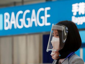 موجة كورونا ثانية تضرب جزيرة يابانية فور رفع الإغلاق缩略图